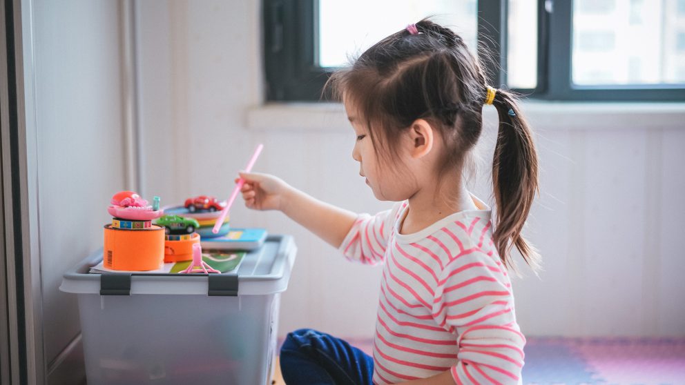 Girl playing with toys